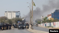 Pakistani police gather after a protest outside the US Consulate General in Karachi on March 1 following the death of Iranian Supreme Leader Ayatollah Ali Khamenei in Tehran the previous day. 
