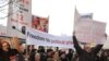 Armenia -- Opposition supporters demonstrate during a visit to Yerevan by Thomas Hammarberg, the Council of Europe's commissioner for human rights, 18Jan2011.
