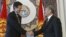 Kyrgyz President Almazbek Atambaev (right) meets with U.S. Assistant Secretary of State Robert Blake in Bishkek on January 16.