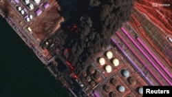 Супутникове зображення, на якому видно пожежу в російському порту Усть-Луга після українського удару, Ленінградська область РФ, 27 березня 2026 року