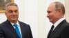 Viktor Orban's meeting with Russian President Vladimir Putin (right) comes as tensions between the West and Moscow have intensified over Russia's movement of troops to areas near its border with Ukraine. (file photo)