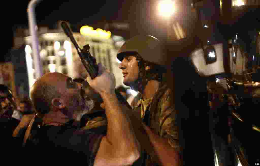 Turkish police arrested Turkish soldiers at Taksim Square in Istanbul.&nbsp;The police force is seen as more closely aligned to the Turkish government than its military, which has traditionally been seen as a protector of Turkey&#39;s secular, democratic constitution.