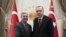 Turkish President Recep Tayyip Erdogan (R) shakes hands with U.S. Senator Lindsey Graham (L) as they pose for a photo at Presidential Complex in Ankara, January 18, 2019
