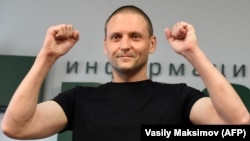 Sergei Udaltsov gestures during his press conference in Moscow on August 10.