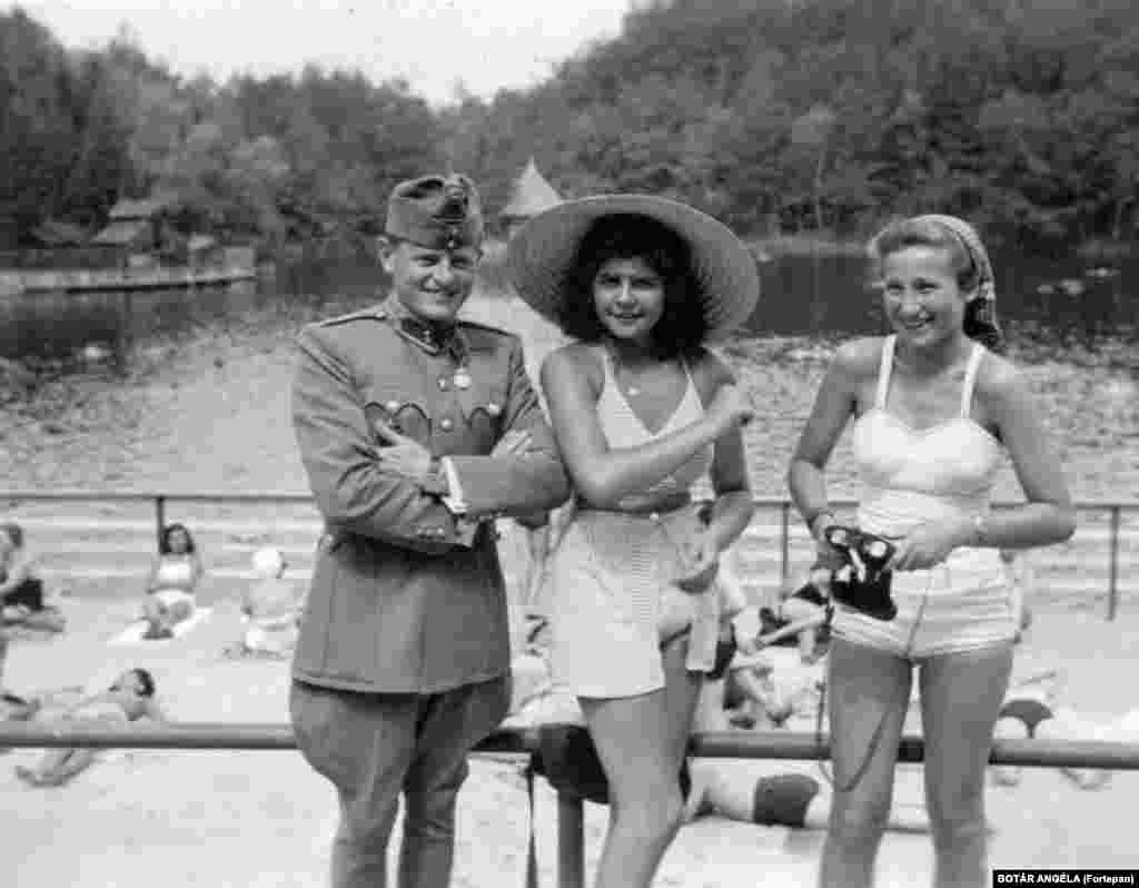 A Hungarian soldier poses with locals in occupied northern Romania in 1942.