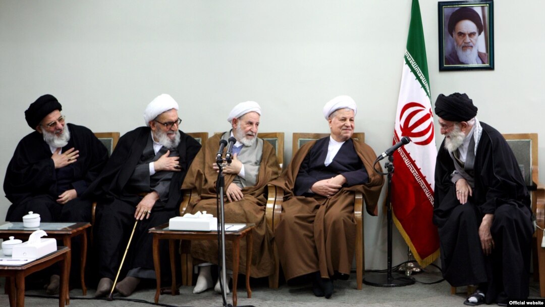 Ex-President Ali Akbar Hashemi Rafsanjani (second from right) at a meeting in 2011 with Supreme Leader Ali Khamenei (right) and members of Iran's powerful Guardians Council.