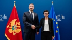 Прем'єр-міністр Чорногорії Мілойко Спаїч та комісар ЄС з питань розширення Марта Кос (архівне фото)