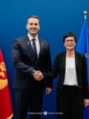 Прем'єр-міністр Чорногорії Мілойко Спаїч та комісар ЄС з питань розширення Марта Кос (архівне фото)