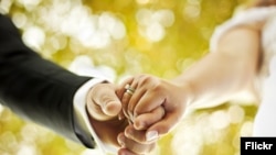 Couple holding hands marriage