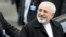 Iranian Foreign Minister Mohammad Javad Zarif leaves his hotel in Lausanne on March 20 after six days of bilateral meetings.