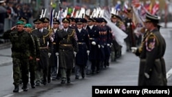 Soldiers march on October 28, 2018, during a military parade marking the 100th anniversary of the creation of Czechoslovakia. 