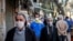 People wearing masks on the streets of Tehran. July 2020. 