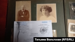 Case documents from the Mikhail Bart case with one of Kirill Gorodetsky's family albums. The photos are of Bart and his wife, Emma.
