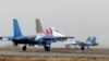 KYRGYZSTAN -- Mig-29 fighter jets during the Russian Air Force jet show at the air base in Kant, outside Bishkek, October 27, 2013