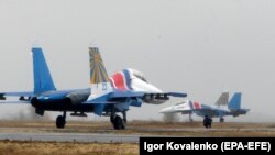 KYRGYZSTAN -- Mig-29 fighter jets during the Russian Air Force jet show at the air base in Kant, outside Bishkek, October 27, 2013