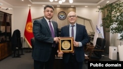 Манасбек Самидинов жана Николя Фай.