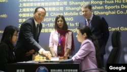 International chess arbiter Shohreh Bayat defied the compulsory headscarf during a game at Shanghai World Championship. 