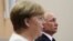 Володимир Путін та Ангела Меркель