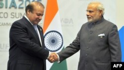 Indian Prime Minister Narendra Modi, right, greets Pakistani Prime Minister Nawaz Sharif ahead of a meeting on the sidelines of the BRICS summit in Ufa on July 10.