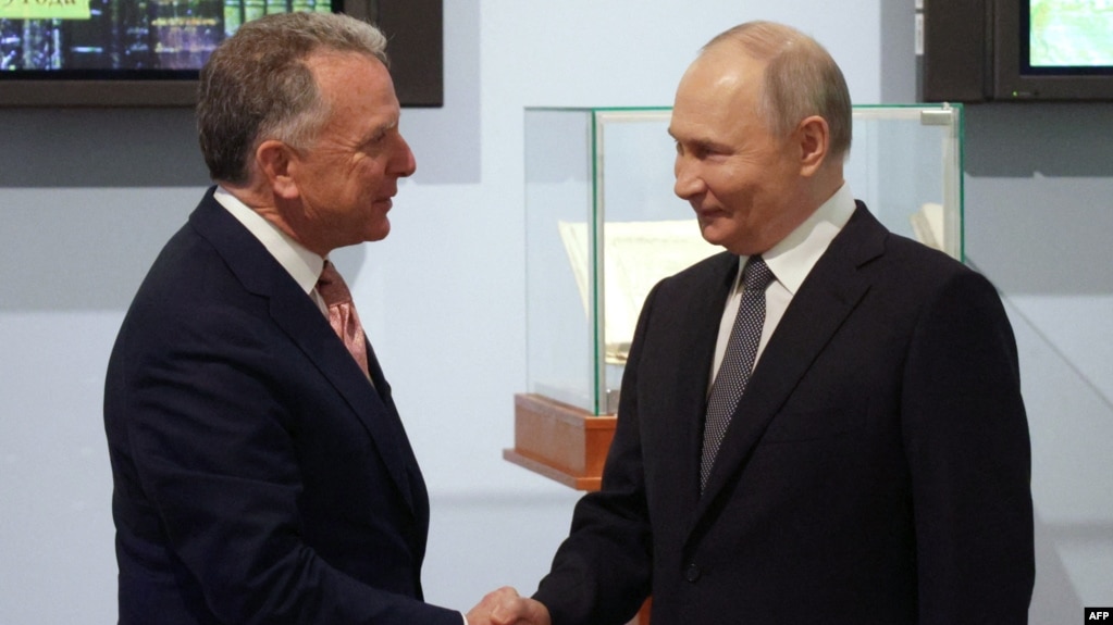 Russian President Vladimir Putin shakes hands with US President Donald Trump's envoy Steve Witkoff during a meeting in Saint Petersburg on April 11.