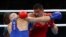 Russia's Yevgeny Tishchenko (R) and Kazakhstan's Vassiliy Levit during an Olympic match which Tishchenko won in a disputed decision.