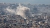 Smoke rises from Beirut's southern suburbs after a strike, as seen from Hadath