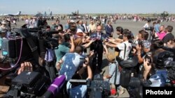 Armenia - Defense Minister Seyran Ohanian speaks to the media at a military airfield just outside Yerevan, 28Jun2013.