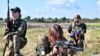 UKRAINE – Female Ukrainian cadets, wearing new military uniforms designed specially for women, attend the "Uniform matters" event organised to present the outfit and test it under military training conditions, on the outskirts of Kyiv on July 12, 2023