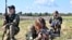 UKRAINE – Female Ukrainian cadets, wearing new military uniforms designed specially for women, attend the "Uniform matters" event organised to present the outfit and test it under military training conditions, on the outskirts of Kyiv on July 12, 2023