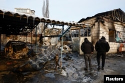 Автомобилен сервиз, ударен по време на руската атака срещу Киев, 24 януари 2026 г.