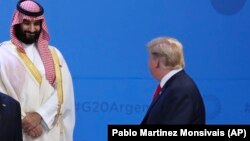 Donald Trump (sağda) və Mohammed bin Salman, Böyük 20-liyin sammiti