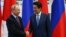 Russian President Vladimir Putin (left) meets with Japanese Prime Minister Shunzo Abe in Vladivostok on September 10. 