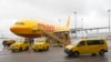 The newspaper reported that the devices ignited in July in depots of global courier DHL in the British city of Birmingham and the German city of Leipzig.