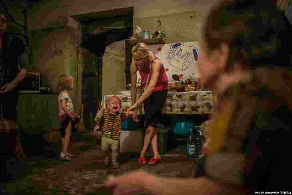 Forty people, including 19 children, live in the shelter. In spite of a cease-fire agreement that went into force in February, there has been little respite from the bombing and shelling that have ravaged Donetsk, and residents are afraid to sleep in their own homes at night.