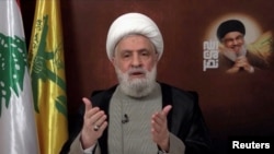 Lebanese Hezbollah leader Sheikh Naim Qassem delivers an address from an unknown location.