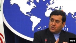 Иран Сыртқы істер министрлігінің өкілі Хассан Қашқави баспасөз мәслихатында. 22 маусым, 2009