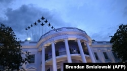 Aircrafts fly in formation over the White House in Washington D.C., US.