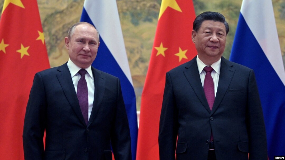 Владимир Путин менен Си Цзинпин.