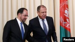 Russian Foreign Minister Sergei Lavrov and his Afghan counterpart Salahuddin Rabbani (left)