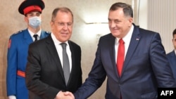 Russian Foreign Minister Sergei Lavrov (left) was presented with the artwork when he met the chairman of Bosnia-Herzegovina's tripartite presidency, Milorad Dodik, in Sarajevo on December 14. 