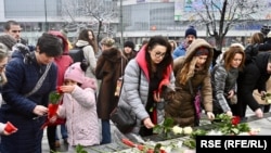 Bosnia and Herzegovina, Sarajevo, more than one hundred citizens gathered in silence to place flowers in front of the state parliament.