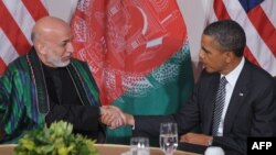 Президенты Афганистана и США - Хамид Карзай и Барак Обама