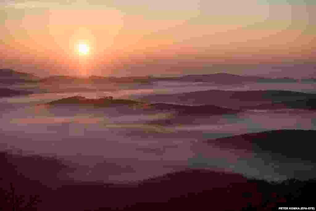 Early morning fog covers the landscape near Salgotarjan, Hungary. (epa-EFE/Peter Komka)