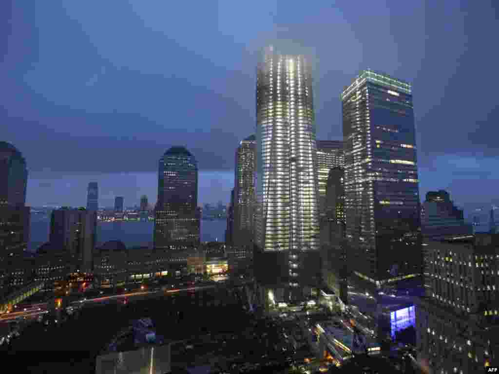 The Freedom Tower at night, shrouded in mist