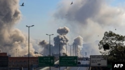 Тегерандагы соккудан кийин асманга көтөрүлгөн түтүн. 5-март.