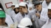 IRAN -- Head of the Atomic Energy Organisation of Iran (AEOI), Ali Akbar Salehi (2nd-R)) addresses workers during a visit at the nuclear power plant of Natanz, November 4, 2019