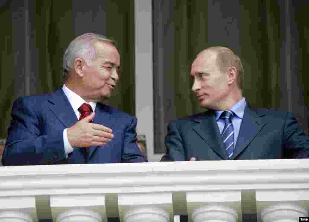 President Islam Karimov (left) with Russian President Vladimir Putin during a meeting in the Black Sea resort of Sochi in May 2006 - At the same time, Uzbekistan has moved forward with a diplomatic swing toward the Shanghai group of states, which includes Russia, China, and others who have not been critical over Andijon.