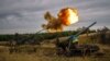 Ukrainian soldiers fire 2S7 Pion self-propelled guns in Ukraine's Donetsk region on August 26.