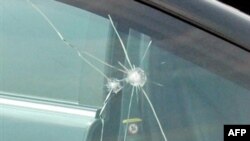 Bullet-holes in Gilani's car 