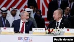 Russia - Armenian Prime Minister Nikol Pashinian and Azerbaijani President Ilham Aliyev attend a BRICS summit in Kazan, October 24, 2024.